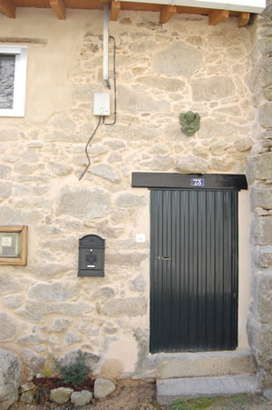 Entrance and kitchen window of Casa de Flores